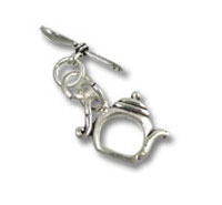 Tea Pot and Spoon Silver