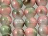 Round Pink, Green, and Brown Glass Bead