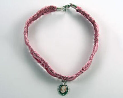 Pink braided choker necklace with cameo pendant