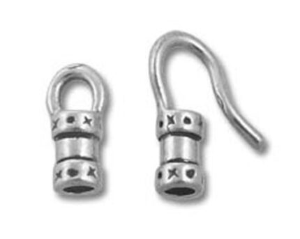 Silver earring findings with star-patterned caps