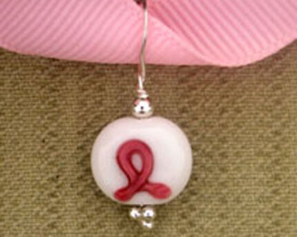 Earring with pink breast cancer ribbon bead