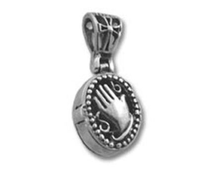 Round silver pendant with raised hand design