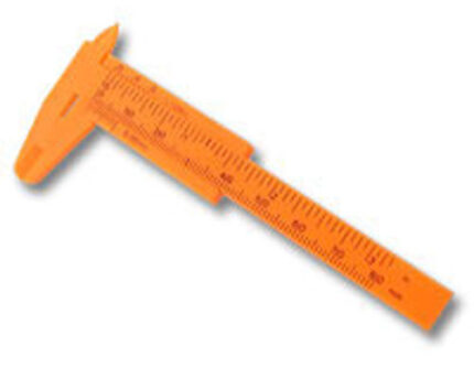 Orange plastic caliper ruler on white background