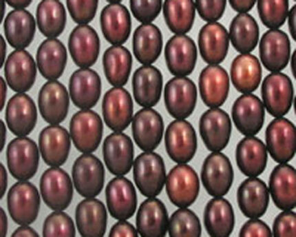 Close-up of burgundy oval pearl beads