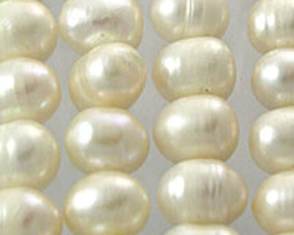 Close-up of creamy white pearl necklace