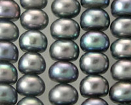 Close-up of dark iridescent pearls