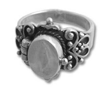 Ornate silver ring with oval gemstone