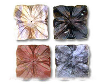 Four colorful carved square flower beads