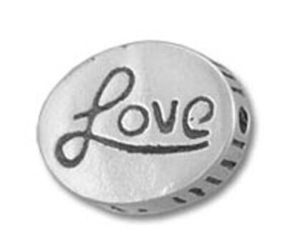 Round silver charm engraved with "Love