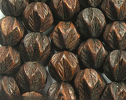 Dark carved wooden beads with leaf pattern