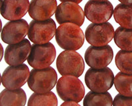 Close-up of red-brown round bead strands