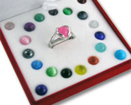 Silver ring with pink stone and colored gems