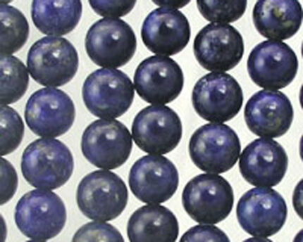 Strands of round dark blue gemstone beads