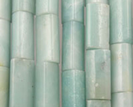 Close-up of pale green cylindrical stone beads