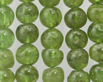 Close-up of translucent green gemstone beads