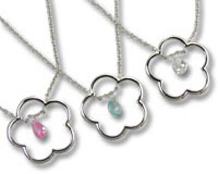 Three silver flower necklaces with teardrop gems