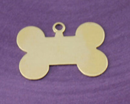 Gold bone-shaped pet ID tag on purple background