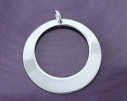 Silver open circle pendant on purple background