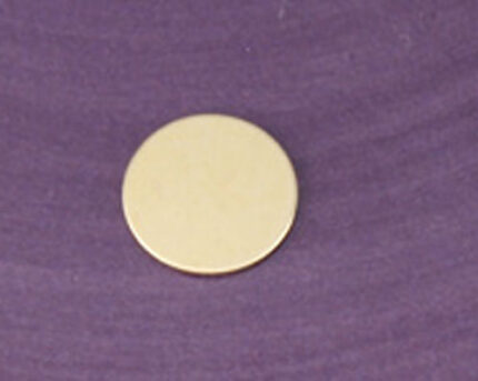 Gold disc on purple textured background