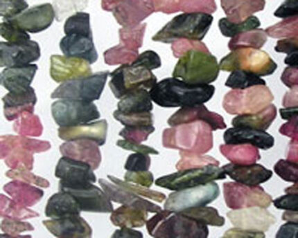 Strands of multicolored gemstone chip beads