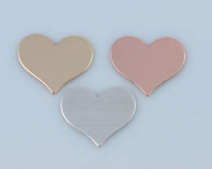 Three metallic heart-shaped tokens in pastel colors