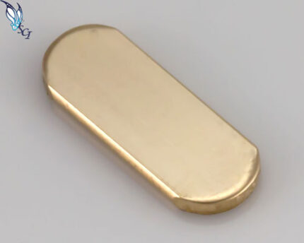 Polished gold pill-shaped metal bar