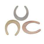 Three crescent-shaped metal jewelry pieces