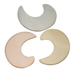 Three crescent-shaped metal discs in different finishes