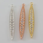 Three marquise crystal pendants in silver, rose, gold