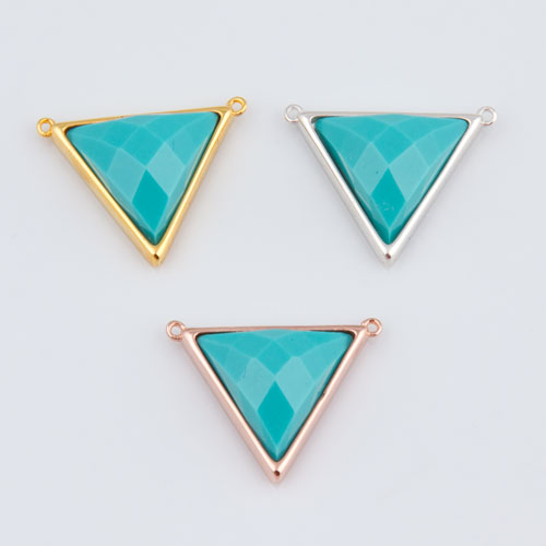 Three triangular turquoise gemstone pendants Three triangular turquoise gemstone pendants