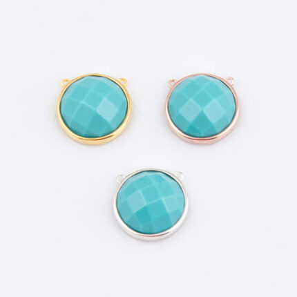 Three turquoise faceted gemstone pendants in metal settings