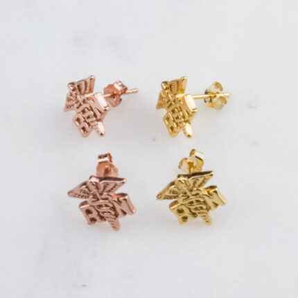 Gold and rose gold star-shaped stud earrings