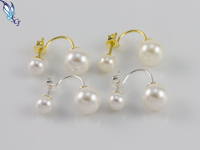 Gold and silver double-sided pearl stud earrings Gold and silver double-sided pearl stud earrings