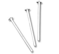 Three metal nails on white background