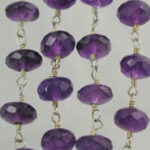 Purple faceted beads on metal links