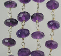 Purple faceted beads on metal links