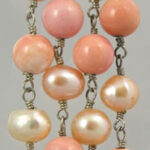 Peach and cream pearl bead strands