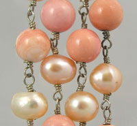Peach and cream pearl bead strands