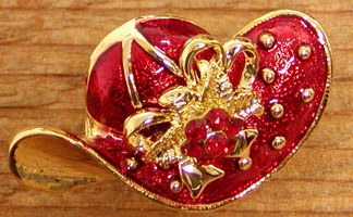 Red enamel hat brooch with gold trim