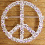Sparkling rhinestone peace sign brooch
