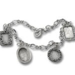 Silver charm bracelet with decorative pendants