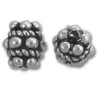 Pair of ornate silver granulated beads
