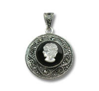Vintage silver cameo pendant with ornate filigree