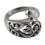 Ornate silver filigree ring with bead accents