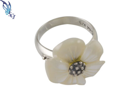 Silver ring with white flower centerpiece