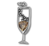 Silver champagne flute pendant with heart gem