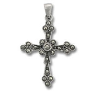 Silver floral cross pendant with stones