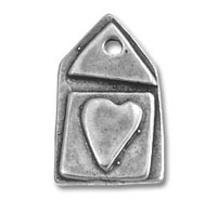 Metal house charm with embossed heart