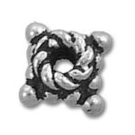 Ornate silver bead with twisted rope design