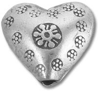 Silver heart-shaped bead with floral motifs